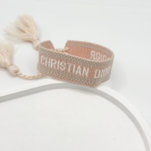 Pulsera De Tela Christhian Dior Rosa Con Gris - Imagen 1